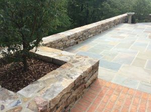 Mixed stone patio and walls